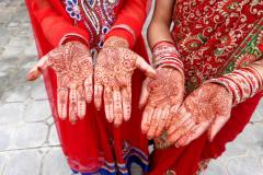 Mehndi hands ddecorations at a wedding ceremony