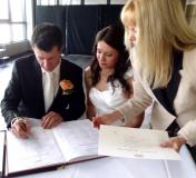 signing the marriage certificate Novotel Manly